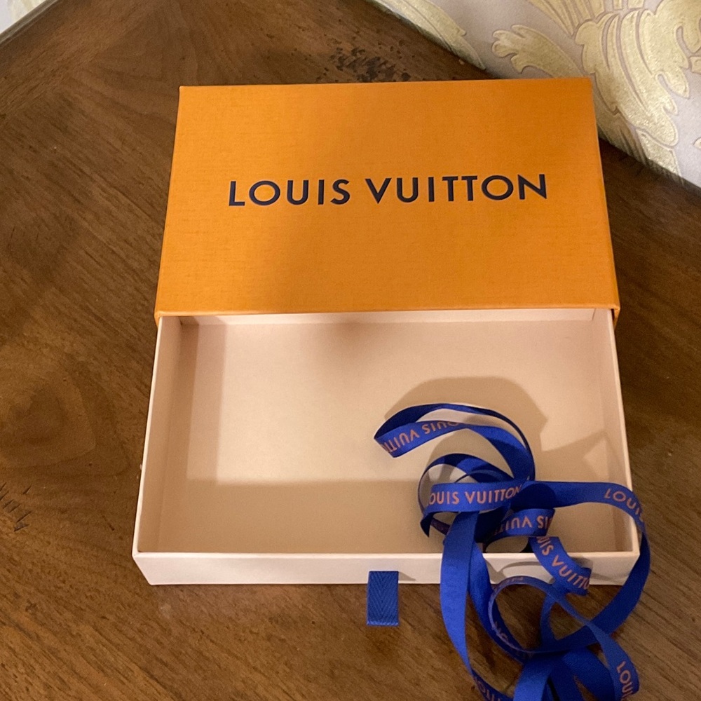 Louis Vuitton large wallet or scarf box with ribbon.